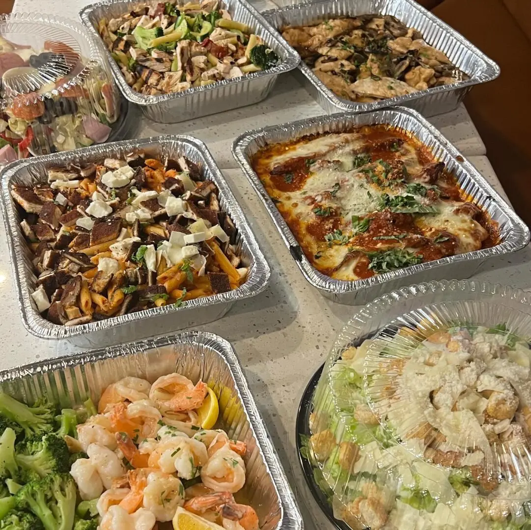 A table topped with lots of different types of food.